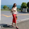 Han Guodong الباب شاطئ البحر على ملابس نسائية في فضفاض القوس ساش كوندول حزام سترة قميص الإناث الصيف 210417