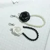 Keychains Fashion Leather Camellia Pearl Phone Chain Women Bag Anti-Lost Lanyard Handbag Pendant Flower Mobile Strap Charm Jewelry Smal22