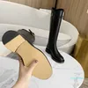 Botas hasta la rodilla de piel de vaca de alta calidad, tacones planos de cuero real negro, hebilla de cinturón triangular, bota larga, zapatos de invierno de diseñador para mujer