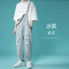 Lös mode överaller män rippade denim koreanska stil rak manlig suspender jeans casual par byxor