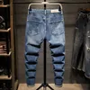Jeans da uomo alla moda in stile coreano retrò blu larghi pantaloni casual in denim hip-hop da strada strappati a gamba larga