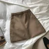 Colori Gonne autunnali di base da donna Moda Gonna a vita alta a trapezio Tasche laterali sottili Mini Pantaloni casual eleganti 2021