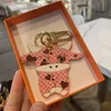 fashion Whole presbyopic bull devil bag ornaments car hanging pink and tender calf car key chain pendant cute year of the ox k272E