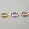 Mode Designer Ring Classic Rostfritt Stål Smycken Guld Kärlek Gift Förlovning Par Ring för Kvinnor Män