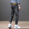 Koreański styl moda mężczyźni dżinsy luźne dopasowanie dżinsowe spodnie harem wysokiej jakości Streetwear Hip Hop Vintage Designer Szerokie spodnie nogi