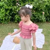 夏の韓国風パフスリーブベビーガールズプリンセスブラウスピュアカラーかわいい幼児子供のトップス子供たちのプリーツシャツ210615