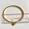 Bracciale rigido con lucchetto all'interno del perimetro 17 cm braccialetti con ciondoli color oro regalo per le feste ZG11802632