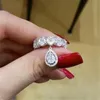 Choucong marca anéis de casamento jóias de luxo 925 prata esterlina meia eternidade corte oval branco topázio cz diamante pedras preciosas com pêra 282h