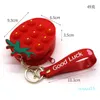 Keychain leksaker mini bubblor väska sensorisk gummi silikon handväska nyckel ring bubbla pussel fodral plånbok myntpåsar för barn