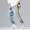 Джинсы для мужчин для карандашных брюки для карандаша старинные полнометражные полномочные модные буквы печатающие ковбойские брюки мужская одежда 210601