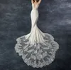 2021 Wspaniały V Neck Syrenki Suknie Ślubne Spaghetti Koronkowe aplikacje Frezowanie Backless Sweep Pociąg Chruch Style Sukienka Bridal Custom