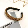 Diseñador de la vendimia Cuero genuino Headbands Hairbands High Quality Womens Twist Weaging Hairhoop Turban Moda Moda Cadena Antidiskid Headwears Accesorios para el cabello