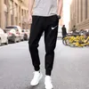 Sports pants men's casual foot binding fashion Korean version guard Pants Black work for summer and Autumn Y0811
