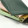 PUレザースクイーズコイン財布バッグ携帯用女性イヤホンヘッドホン収納袋クレジットカードホルダーEDC化粧品バッグRRA11696