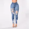 Jeans skinny elasticizzati strappati a vita alta da donna Streetwear Pantaloni casual in denim con foro solido femminile di alta qualità