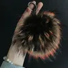 Llaveros Magicfur - 1PCS Piel de mapache real genuina Suave grande Pom Ball Bag Charm Llavero Llavero