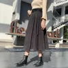 JXMYY The irregular woolen twill skirt can not afford the ball does not fade A-line mid-length solid color elastic 210412