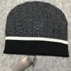 Designers Knit Wool Beanie Earmuffs Hat Wool Pure Color Label Cap Knitting Hat Bonnet for Women Men Sport Warm Winter Skull Hat6189462