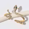 Artilady 2 pezzi set clip su orecchini polsini dell'orecchio per le donne color oro serpente CA pietra accessori orecchino di fascino