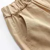 Summer 3 4 5 6 8 10 12 Years Children Clothing Solid Color Cotton Half Fifth Capris Pocket Cargo Shorts For Kids Baby Boys 210529