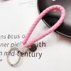 Diamond woven leather rope creative car key chain pendant men and women waist ring bag