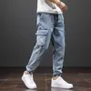 Wiosna Lato Czarne Niebieskie Dżinsy Mężczyźni Streetwear Multi-kieszenie Spodnie Cargo Joggers Spodnie Jean Plus Size 6XL 7XL 8XL 210716