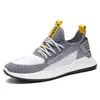 2021 Spring Leisure Shoes preguiçoso Respirável Net Black Cinzento Amarelo Versão coreana de Flying Knit Sneakers Masculinos Esportes Cross-fronteiriços 39-44 Um