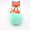 Keychains 50pcs Fur Ball Keychain Charm Key Ring Cute Leather Keyring Plush Fluffy Pompom Faux Bag Car Charms Accessory Miri22