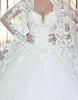 Suknia Balowa Koronki Suknie Ślubne 2021 Z Długim Rękawem Przezroczyste Winter Style Custom Princess Bridal Vestido De Novia Wysokiej jakości Tulle