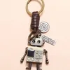 Anahtarlıklar Vintage LIME MOVEBLE ROBOT KEYHAIN KADINLAR Creative Metal Anahtar Kolye Anahipler Erkek El Dokunur Cowhide Deri Araba Zinciri329L