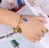 WT-REB001 Mode Vrouwen Islamitische Turkse Blauwe Roestvrijstalen Oog Fatima's Hand Evil Bracelet