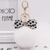 10pieces / lotto Leopard Bow Peluche Portachiavi Keychain Creativo Portachiavi Fure Ball Bag Pendente Catena Portachiavi Donna Donna