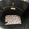 Mode 2st leopard axel shoppingväska hjärta tote designer handväska perforerad leopardbrev canvas äkta läder öppen ficka mjuk hink mynt handväska gm stor