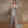 Silver Långärmade Sida Split Mermaid Evening Dresses Beaded Sequined Sheer Neck Sweep Train Satin Formell Prom Crows