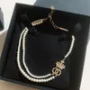 Dubbelt pärlhalsband Damsmycken Designer Crown Pendant Halsband Lyxigt högkvalitativt modehalsband Perla Collar Chain D2111051HL