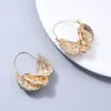 Boucle d'oreille en spirale brillante pour femmes rétro en métal doré strass en métal irrégulier Boucles d'oreilles de fête de voyage de voyage bijoux en gros