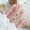 boucles d'oreilles nœuds d'amour or