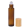 5 ml 10 ml bouteilles de rouleaux en verre transparent givré avec rouleaux en métal flacons d'huile essentielle avec capuchon en bambou