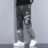 Mens Jeans Outono Letra Impressa Maré Marca Solta Dos Desenhos Animados Graffiti Calças Com Cordão Homens Streetwear