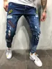 Bomullsblandning Skinny Hole Ripped Denim Jeans för män Hip Hop Slim Fit Streetwear Patchwork Badge Distressed Blue Pencts Pants X0621