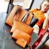 ファッションレディーストートバッグシンプルなスタイルのバット型のデザインカラーマッチング女性バッグPUハンドバッグミニ財布