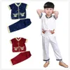 Kungfu kläder passar baby pojke kinesiska traditionella kostymer barn cardigan tee skjorta byxa tang sport kostym mjuk broderi 2104056186