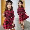 Jupe pour enfants nouvelle robe à carreaux à manches longues pour filles pour l'automne CUHK style coréen pur coton taille princesse jupe