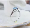 女性のための1 CT 6.5mmの海の青い石の婚約指輪925スターリングシルバーリング結婚式ジュエリーJ-362