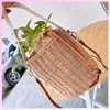 2021 المرأة سلة دلو حقيبة حقائب القش حقيبة يد حمل الشاطئ الكتف Crossbody حقائب يد نسائية Luxurys المصممين حقائب اليد المحافظ 2106111L