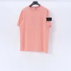 T-shirt d'été de haute qualité pour hommes Badge Manches courtes en coton ample et respirant à la mode Top simple pour couple de sport Marque de mode européenne américaine