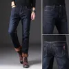 Jeans pour hommes 2021 Hommes d'hiver plus velours épaissie jeunesse mince élastique casual pantalon chaud pieds pieds mâles