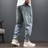 メンズジーンズ2022秋のファッションブランド着用ハーランの特大サイズのゆるい穴のライト香港スタイルヒップホップオリジナルの小さな足のズボン