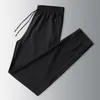 2021 Summer Mens Casual Elastic Waist pants Breathable Soft Stretch Ice Silk trousers Solid Joggers L-8XL Men Clothing NK007