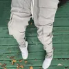 High Street Multi-Pocket Pants Sweatpants Män och kvinnor som drabbas av solid Casual Harem-joggar överdimensionerade baggy spår herr